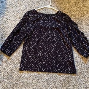 Black blouse.